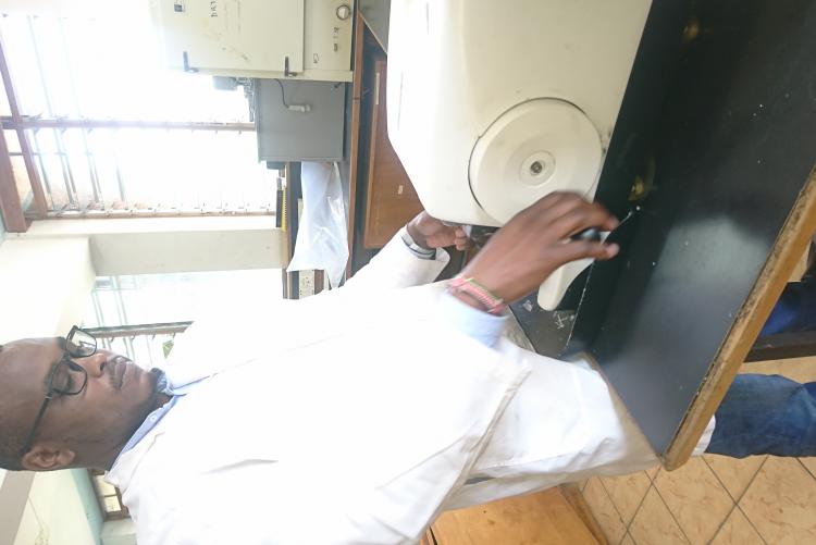 Anatomy Technologist Mr. Robert Chemjor Performs Tissue sectioning Using Rotary  Microtome