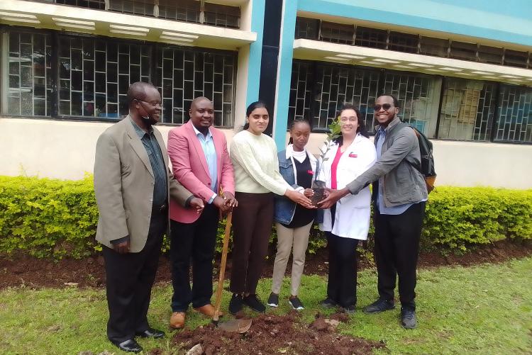 STAFFS AND STUDENTS PARTICIPATING IN FACULTY  TREE PLANTING EXERCISE
